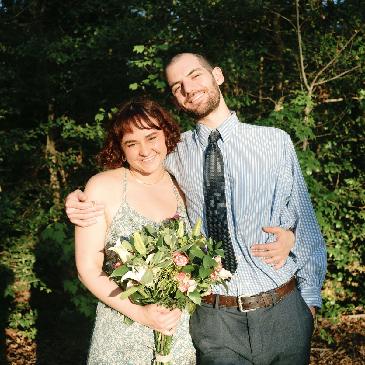 Matthew Barber and Grace Bryan smiling together outdoors